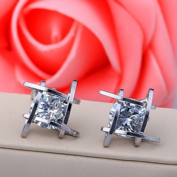 Silvertone CZ Stud Earrings - Picture 1 of 3